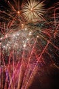 Vertical shot of bright fireworks show