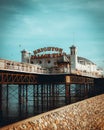 Vertical shot of Brighton Palace Pier with a blue cloudy sky in the background, Broadstairs, UK