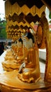 Vertical shot of bronze traditional statues in China Folk Village theme park in Shenzhen, China