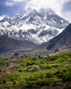 Vertical shot of Buddhist Hindu site of Muktinath in Thorong La Mountain pass in Upper Mustang Nepal Royalty Free Stock Photo