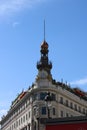 Vertical shot of the Building Banesto under the sunlight and a blue sky in Madrid, Spain Royalty Free Stock Photo