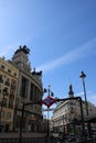 Vertical shot of the Building Banesto under the sunlight and a blue sky in Madrid, Spain Royalty Free Stock Photo