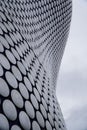 Vertical shot of a building with dots in Birmingham, United Kingdom