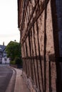 Vertical shot of a building with visible wooden constructions