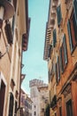 Vertical shot of buildings with the Scaligero Castle on the background in Sirmione, Italy