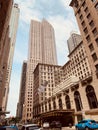 Vertical shot of a bustling road near tall downtown buildings in Chicago, USA