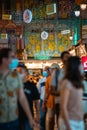 Vertical shot of a busy street in Chinatown, Singapore at night Royalty Free Stock Photo