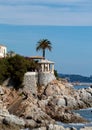 Vertical shot of Cami Ronda de S'Agaro a Sa Conca S'Agaro with rocks on the beach in Spain Royalty Free Stock Photo