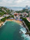 Vertical Shot: Captivating View of La Angosta Beach in Acapulco