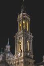 Vertical shot of the Cathedral-Basilica of Our Lady of the Pillar in Zaragoza, Spain by night Royalty Free Stock Photo