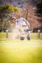 Vertical Shot Of A Caucasian Male Golfer Playing A Chip Shot On A Golf Course In South Africa