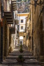 Vertical shot of Cefalu Old Town buildings and staircases in Sicily, Italy Royalty Free Stock Photo