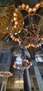 Vertical shot of the chandeliers in the Saint Hagia Sophia, Turkey