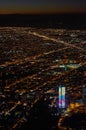 A vertical shot of the city of Bogota at dusk from Monserrate, with night lights and the Colpatria skyscraper on the lower side of Royalty Free Stock Photo