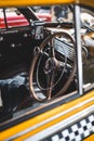 Vertical shot of a classic American yellow cab taxi interior