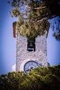 Vertical shot of a clock tower in Cannes, France