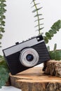 Vertical shot close up of old fashioned retro photo camera. Royalty Free Stock Photo
