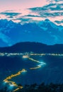 Vertical shot of a cloudy sky over the Meili Snow Mountains in the Chinese province of Yunnan. Royalty Free Stock Photo