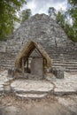 Vertical shot of the Coba Mayan pyramid in Mexico surrounded by trees Royalty Free Stock Photo