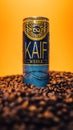 Vertical shot of a coffee soda KAIF Mocca Coffee on a yellow background Royalty Free Stock Photo
