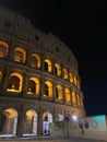 Vertical shot of the Colloseum in Rome by night Royalty Free Stock Photo