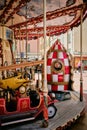 Vertical shot of a colorful carousel captured in Menton, French Riviera, France