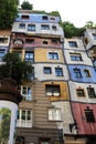 Vertical shot of a colorful Famous building in Hundertwasser Village in Vienna, Austria.