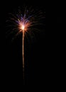 Vertical shot of the colorful fireworks shining bright in the dark black night sky Royalty Free Stock Photo