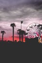 Vertical shot of colorful skies and a Ferris wheel with free space for text Royalty Free Stock Photo