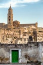 Vertical shot of the Convent of Saint Agostino against the blue sky in Matera, Italy