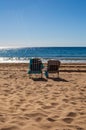 Vertical shot of the couches by the beach Royalty Free Stock Photo