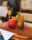 Vertical shot of a couple of cool cocktails on a bar