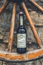 Vertical shot of a craft beer on a vintage wheel