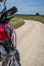 Vertical shot of a CRF1000L Honda Africa Twin adventure bike on a dusty trail