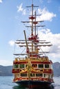 Vertical shot of cruise ship in the shape of a pirate ship sailing on Lake Ashi in Hakone, Japan