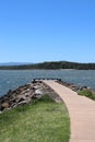 Vertical shot of a Culburra Beach, South Coast, Australia with a road leading to the coast Royalty Free Stock Photo