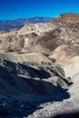 Vertical shot of curly mountains in Death Valley National Park in Skidoo locating in California