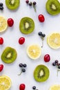 Vertical shot of Currant, Cornus and dogberry, lemon and kiwi close- Royalty Free Stock Photo