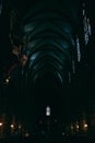 Vertical shot of the dark hallway inside Notre Dame Cathedral captured in Strasbourg, France
