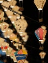 Vertical shot of decorative hot air balloon lanterns illuminated at night