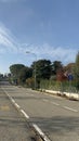 Vertical shot of a deserted street with no people or traffic in sight