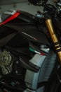 Vertical shot of the details of streetfighter V4 SP motorcycle, iconic Italian brand