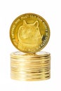 Vertical shot of a digital dog coin on a bunch of golden coins isolated on a white background Royalty Free Stock Photo