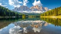 Vertical shot of the Dolomites mountain reflected in the waters of lake Lago Federa on a sunny day Royalty Free Stock Photo