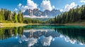 Vertical shot of the Dolomites mountain reflected in the waters of lake Lago Federa on a sunny day