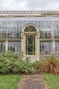 Vertical shot of the door of a greenhouse building in the National Botanic Gardens. Dublin, Ireland.