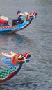Vertical shot of dragon boat heads during the Asian traditional competition in Taipei, Taiwan