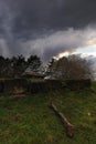 Vertical shot of dramatic sunset sky over a field Royalty Free Stock Photo