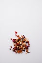 Vertical shot of dried rose petals isolated on white background Royalty Free Stock Photo