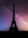 Vertical shot of the Eiffel Tower in Paris France under a galaxy starry sky Royalty Free Stock Photo